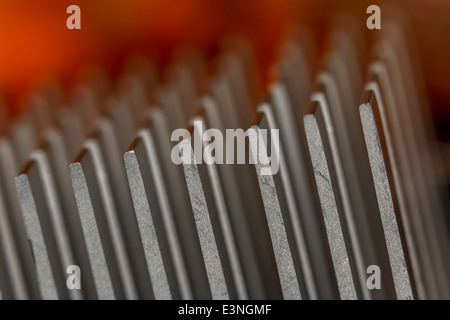 Macro-photo showing the cooling fins of a PC heat-sink used to cool motherboard chips. For focus info see 'Description' section. Stock Photo