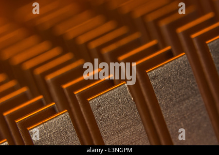 Macro-photo showing the cooling fins of a PC heat-sink used to cool motherboard chips. For focus info see 'Description' section. Stock Photo
