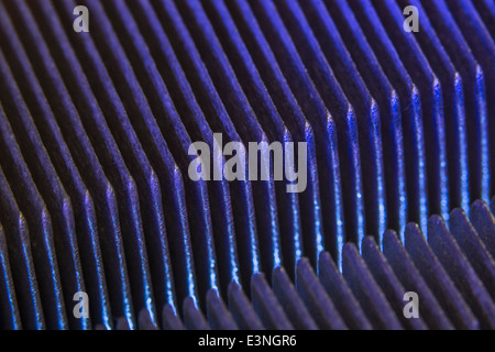 Macro-photo showing the cooling fins of a PC CPU cooling (fan) unit. For focus info see 'Description' section. Stock Photo