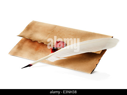 old, vintage envelope and quill pen isolated Stock Photo