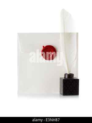 mail envelope or letter sealed with wax seal stamp and quill pen isolated on white Stock Photo