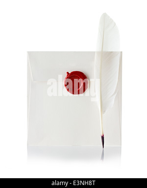 mail envelope or letter sealed with wax seal stamp and quill pen isolated on white Stock Photo