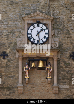 Clock with Roman soldiers on the thirteenth-century west tower all that remains of St Martin's (or Carfax) Church, Oxford, UK