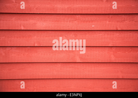 horizontal picture of horizontal planks with bright red paint Stock Photo