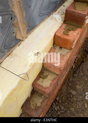 self building house, 100mm insulation in walls built from thermalite block and brick Stock Photo