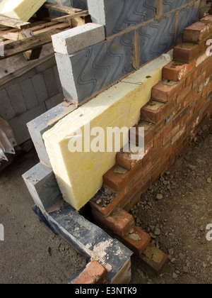 self building house, 100mm insulation in walls built from thermalite block and brick Stock Photo