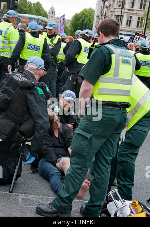 Teacher Amy Jowett broke leg after being kicked by police officer during  United Against Fascism protest against BNP june 2013 Stock Photo