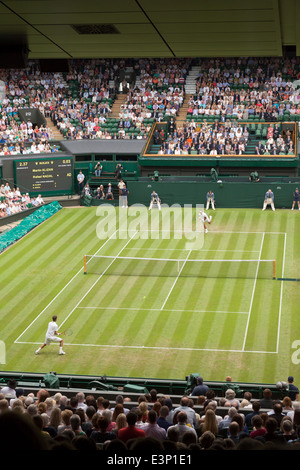 Mens singles tennis match, Wimbledon Tennis championship 2014, All England Lawn Tennis Club, London UK Stock Photo