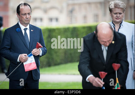 (L-R) French President Francois Hollande, Romanian President Traian Basescu and Lithuanian President Dalia Grybauskaite attend a ceremony marking the centenary of the outbreak of World War I, in Ypres, Belgium on 26.06.2014 During the war, hundreds of thousands of soldiers and civilians from all over the world lost their lives around the Belgian town of Ypres. To mark the occasion, the European Union donated a symbolic bench with bronzed copper plates reading the word 'Peace' in the EU's 24 official languages. by Wiktor Dabkowski Stock Photo