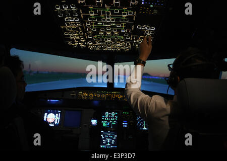 June 27, 2014 - West Jakarta, Jakarta, Indonesia - Cabin crews trainee at the Garuda Indonesia Training Centre. As the air travel is marked as the safest, the aim of the trainee is zero accident victim. The trainee is needed to get the certificates of IATA, a trade association representing and serving the airline industry world-wide. (Credit Image: © Afriadi Hikmal/ZUMA Wire/ZUMAPRESS.com) Stock Photo