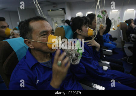 June 27, 2014 - West Jakarta, Jakarta, Indonesia - Cabin crews trainee at the Garuda Indonesia Training Centre. As the air travel is marked as the safest, the aim of the trainee is zero accident victim. The trainee is needed to get the certificates of IATA, a trade association representing and serving the airline industry world-wide. (Credit Image: © Afriadi Hikmal/ZUMA Wire/ZUMAPRESS.com) Stock Photo