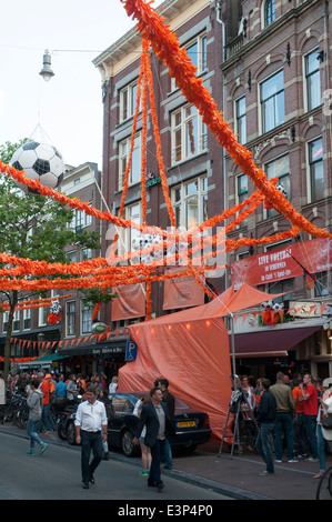 Supporters of the Netherlands football (soccer) team celebrate a win against Chile in the 2014 FIFA World Cup Stock Photo