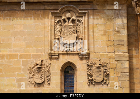 Santo Domingo de la Calzada, La Rioja, Spain. Carved stone coats of arms on the cathedral walls. Stock Photo