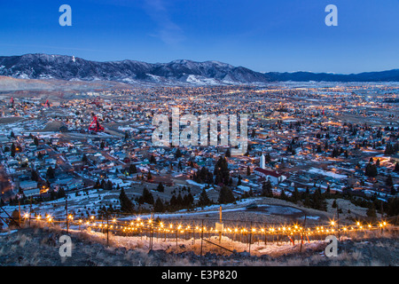 Looking down upon the Berkley Pit and mining head frames from above the M in Butte, Montana, USA at dusk Stock Photo