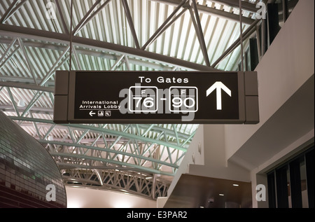 departure and arrival gates signs in airport Stock Photo