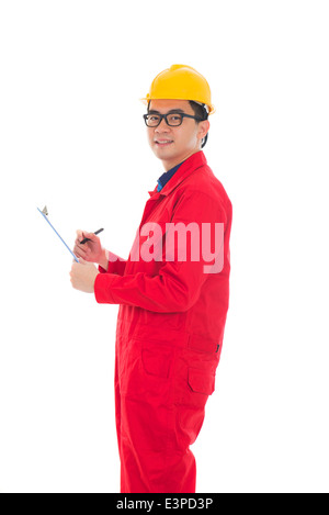 asian male engineer doing report in white background Stock Photo