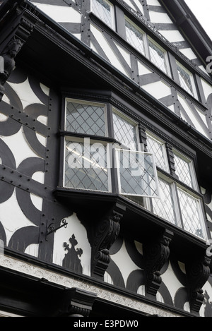 Old black and white tudor building in Chester England showing leaded windows. Stock Photo