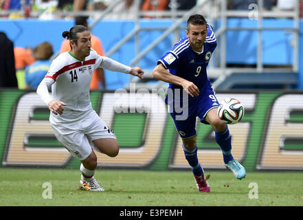 Salvador, Brazil. 24th June, 2014. Bosnia And Herzegovina's Vedad Ibisevic runs with the ball during a Group F match between Bosnia And Herzegovina and Iran of 2014 FIFA World Cup at the Arena Fonte Nova Stadium in Salvador, Brazil, June 24, 2014. © Yang Lei/Xinhua/Alamy Live News Stock Photo