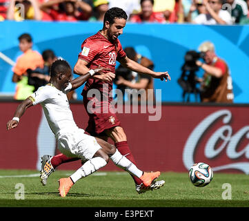 Brasilia, Brazil. 26th June, 2014. Portugal's Ruben Amorim (R) competes with Gana's Christian Atsu during a Group G match between Portugal and Ghana of 2014 FIFA World Cup at the Estadio Nacional Stadium in Brasilia, Brazil, June 26, 2014. Portugal won 2-1 over Ghana on Thursday. © Qi Heng/Xinhua/Alamy Live News Stock Photo
