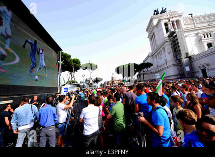 Rome, Italy. 24th June, 2014. Italy's supporters watch a Group D match between Italy and Uruguay of 2014 FIFA World Cup, at the Piazza Venezia square in Rome, capital of Italy, June 24, 2014. Italy lost the game by 0-1 on Tuesday. © Xu Nizhi/Xinhua/Alamy Live News Stock Photo