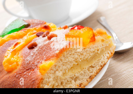 a piece of coca de Sant Joan, a typical sweet flat cake from Catalonia, Spain, eaten on Saint Johns Eve, and a cup of hot chocol Stock Photo