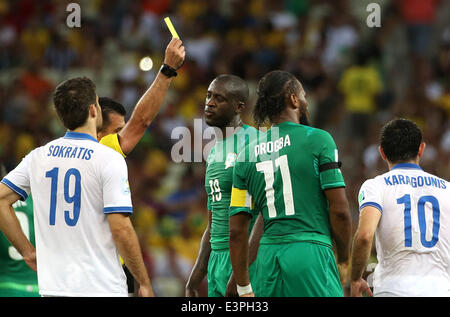 (140624) -- FORTALEZA, June 24, 2014 (Xinhua) -- Referee Carlos Vera (2nd L) from Ecuador gives a yellow card to Cote d'Ivoire's Didier Drogba (2nd R) during a Group C match between Greece and Cote d'Ivoire of 2014 FIFA World Cup at the Estadio Castelao Stadium in Fortaleza, Brazil, June 24, 2014. Greece won 2-1 over Cote d'Ivoire on Tuesday. (Xinhua/Cao Can)(xzj) Stock Photo