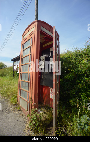 overgrown telephone box united kingdom Stock Photo