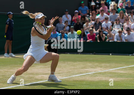 London, UK. 27th June, 2014. Wimbledon Tennis Championships Caroline Wozniacki of Denmark in action against Ana Konjuh of Croatia during day five ladies singles third round match at the Wimbledon Tennis Championships at The All England Lawn Tennis Club in London, United Kingdom Credit:  Action Plus Sports/Alamy Live News Stock Photo