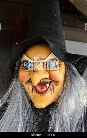 A smiling witch puppet on sale in Prague market, Czech Republic. Stock Photo