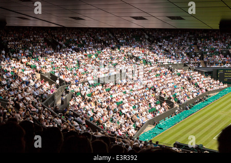 Centre Court crowd of spectators, Wimbledon All England Lawn Tennis Club Championships, Wimbledon London UK Stock Photo