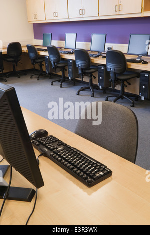 Computing classroom in a modern secondary school. Stock Photo