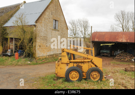 Agricultural Handler on a farm close to Winchcombe in the Cotswolds, Gloucestershire, England, UK Stock Photo