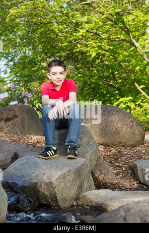 Portrait of a young boy outdoors in springtime Stock Photo