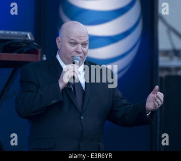 Hollywood, California, USA. 24th June, 2014. Jimmy Kimmel Live! Warm Up Comic Don Barris performs each day before JKL before the show's taping as well as in between set and break downs of skits, gags and musical performances. Known for his distinctive voice, Barris, a native of Chicago, has worked on Comedy Central as well as in movies and tv shows. In the photo, Barris is on stage before a musical performance at the JKL outside stage on Monday June 24, 2014. © David Bro/ZUMAPRESS.com/Alamy Live News Stock Photo