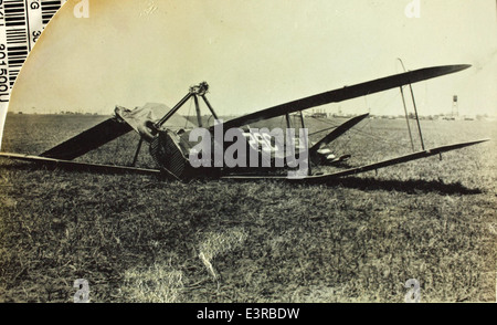This image documents a significant aircraft accident, capturing the aftermath of a crash involving a military or civilian aircraft. Such photos contribute to aviation safety and accident investigation records. Stock Photo