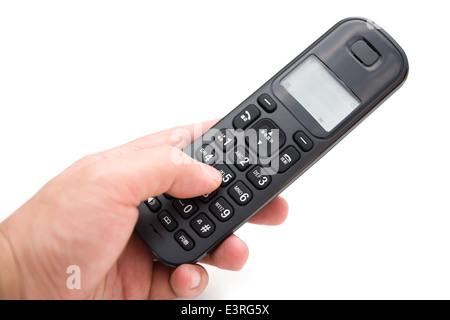 man dialing a wireless telephone with clipping path Stock Photo
