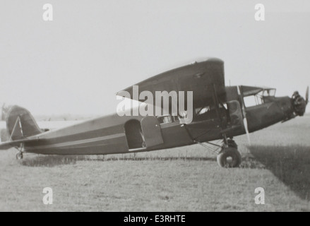 This photograph features the Stinson SM-6000B, a civilian transport aircraft designed by the Stinson Aircraft Company. Introduced in the late 1930s, the SM-6000B was known for its large capacity and rugged design, used in both commercial and military applications. It was popular among airlines and as a transport aircraft during the early years of World War II. Stock Photo