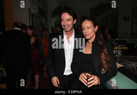 Munich, Germany. 27th June, 2014. Austrian actress Sonja Kirchberger and Martin Bachmann, Managing Director os Sony Pictures pose during the opening of the Munich film festival in Munich, Germany, 27 June 2014. The festival runs from 27 June to 05 July 2014. Photo: Felix Hoerhager/dpa/Alamy Live News Stock Photo