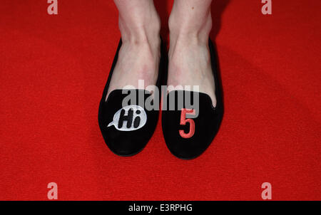 Munich, Germany. 27th June, 2014. A guest wears shoes with 'Hi 5' written on it during the opening of the Munich film festival in Munich, Germany, 27 June 2014. The festival runs from 27 June to 05 July 2014. Photo: Felix Hoerhager/dpa/Alamy Live News Stock Photo