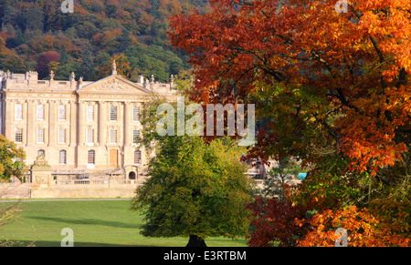 Chatsworth House stately home viewed from open access parkland, Peak District, England, UK - autumn Stock Photo