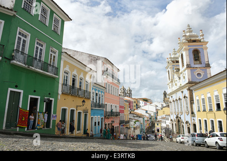SALVADOR, BRAZIL - OCTOBER 15, 2013: Tourists and locals mix on the cobblestone streets of colonial Pelourinho. Stock Photo