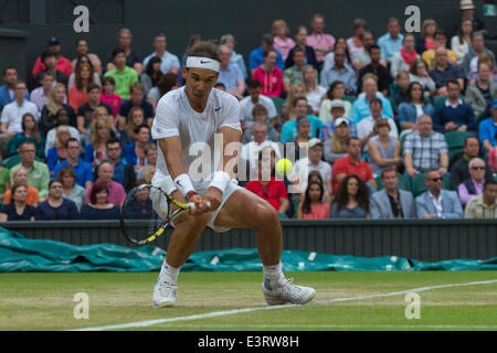 London, UK. 28th June, 2014. Wimbledon Championships Day Six. Rafael Nadal of Spain in action against Mikhail Kukushkin of Kazakhstan during day six men's singles third round match at the Wimbledon Tennis Championships at The All England Lawn Tennis Club in London, United Kingdom. Credit:  Action Plus Sports/Alamy Live News Stock Photo