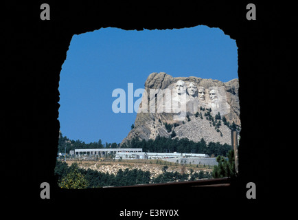 A Route 16A highway tunnel frames the faces of four U.S. Presidents at the Mount Rushmore National Memorial in South Dakota,USA. Stock Photo