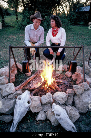 coffee pot boiling over an open fire cowboy flame smoke caffine wild west  Stock Photo - Alamy