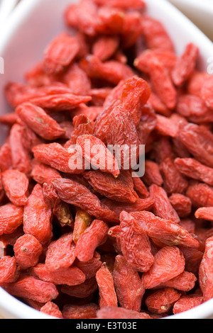 Lycium barbarum. Bowl of Goji berries. Stock Photo