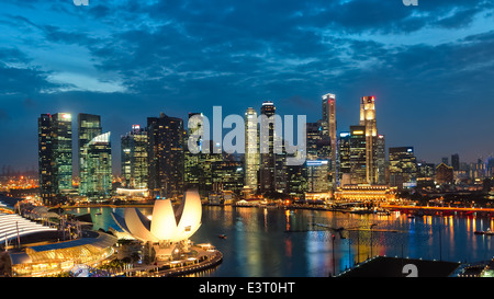 The Singapore skyline in the evening. Stock Photo