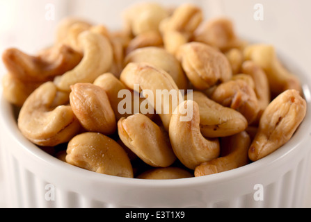 Selective focus on the front cashew nuts in bowl Stock Photo