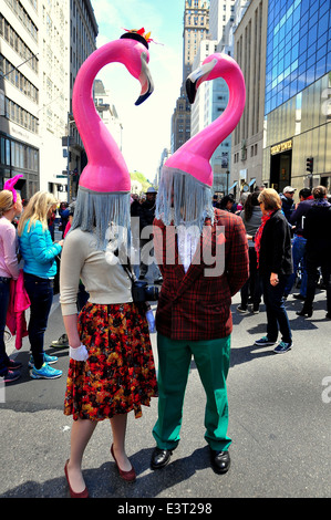 NYC: Couple sporting flamingo hats at the annual Easter Parade on Fifth Avenue * Stock Photo