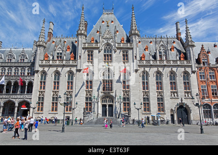 BRUGGE, BELGIUM - JUNE 13, 2014: The Grote Markt and the Provinciaal Hof gothic building. Stock Photo