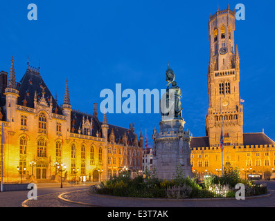 Bruges - Grote markt in evening dusk. Belfort van Brugge and Provinciaal Hof buildings Stock Photo